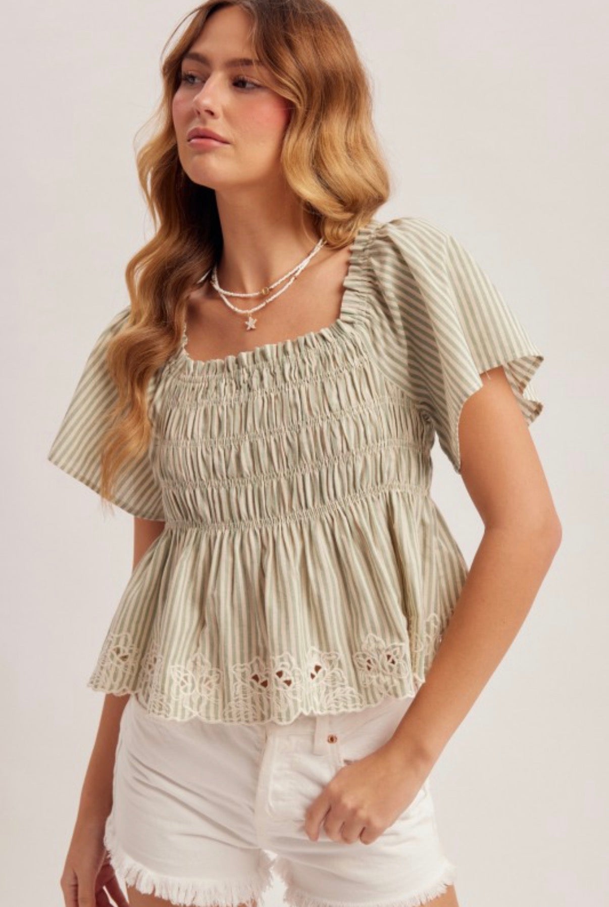 Embroidered Peplum Top