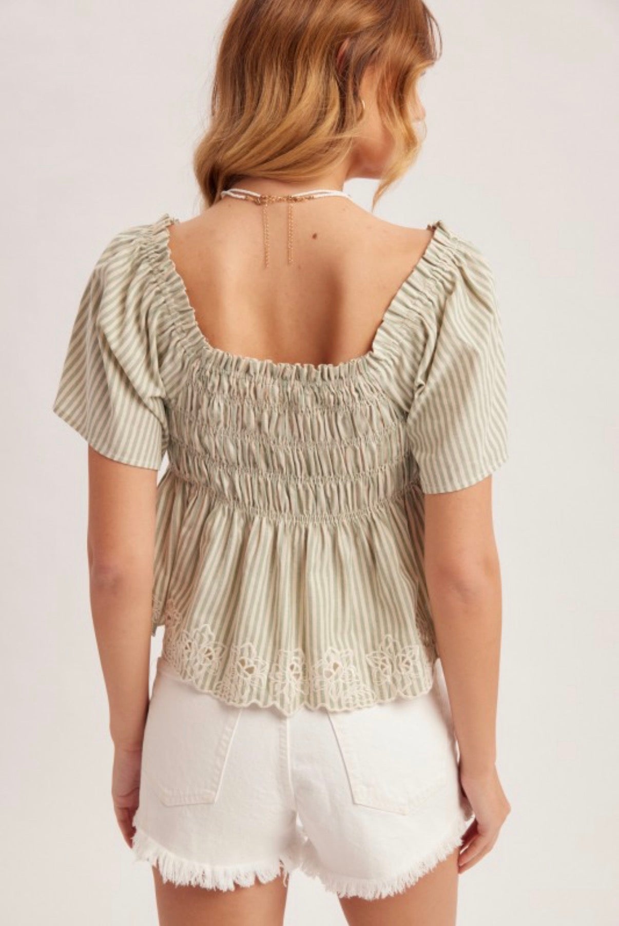 Embroidered Peplum Top